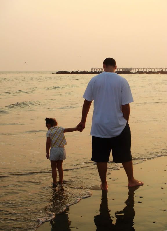 IMAGE: http://i101.photobucket.com/albums/m56/tania622/walkingonthebeachcopy.jpg